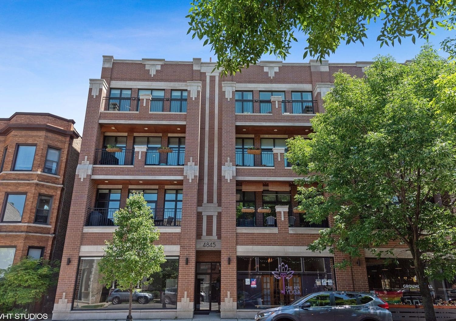 A picture of the scenic storefront of One Key Yoga Studio on Damen Avenue