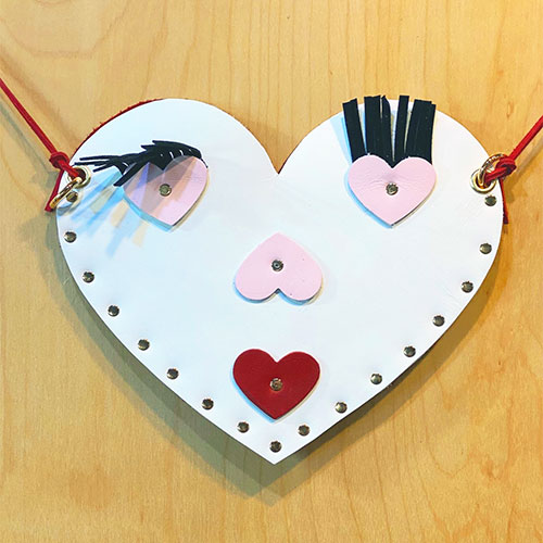 Example of a leather heart-shaped clutch made at theChicago School of Shoemaking and Leather Arts