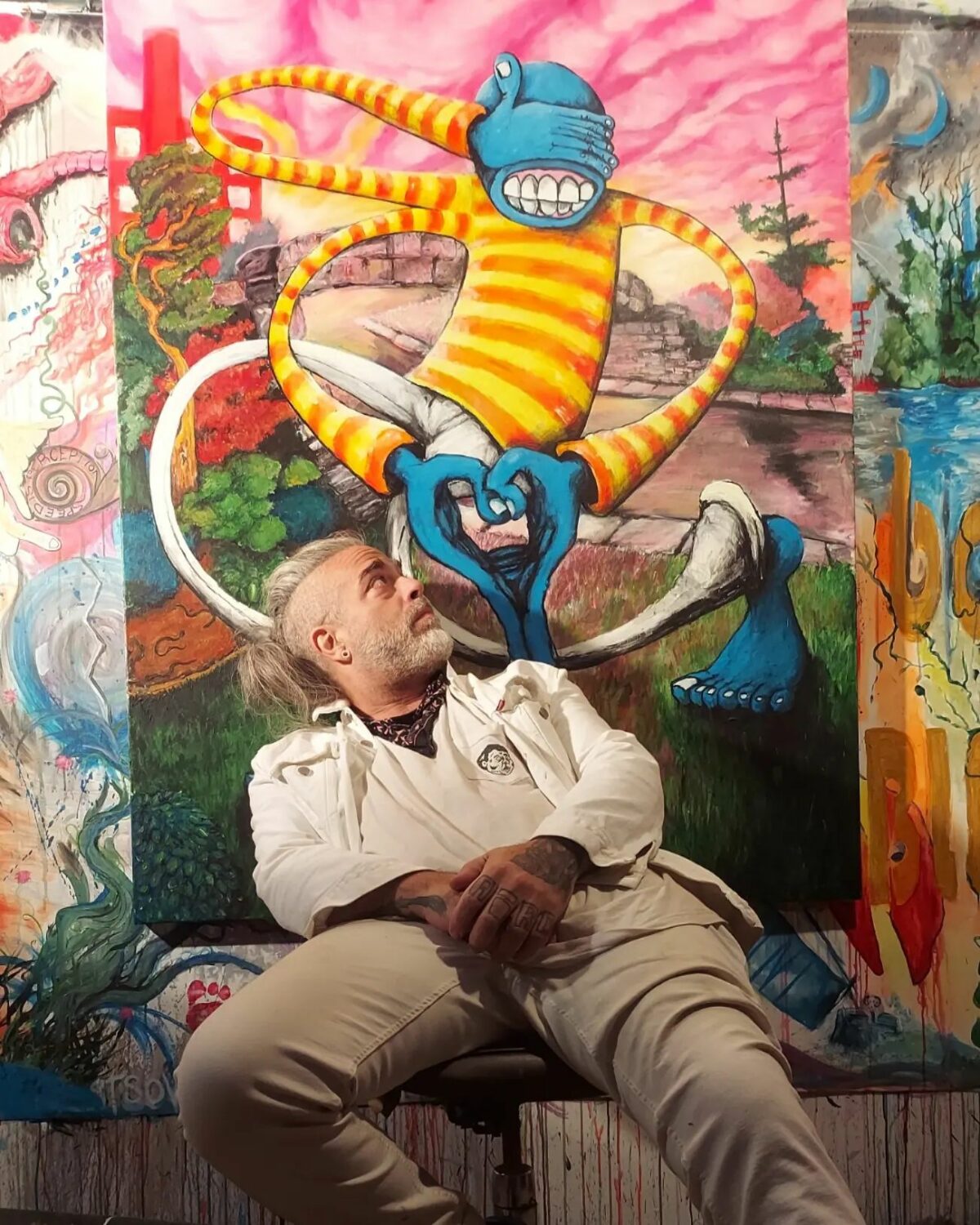 John Airo, artist, with sketch