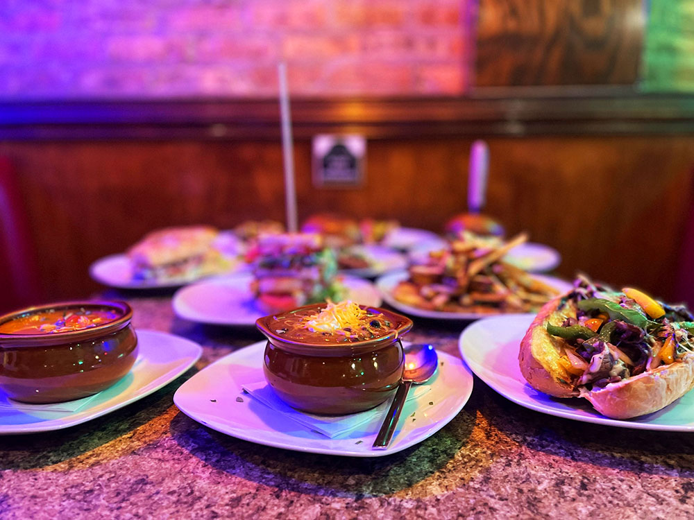 A spread of food Falcon's Handcrafted Sandwiches